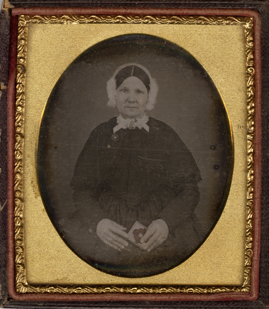 Photo Detail - Anonymous - Woman Holding Dag Case