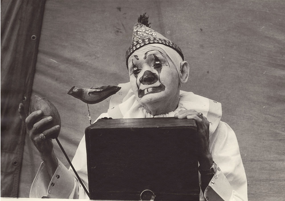 Photo Detail - Kenneth Heilbron - Millers Bros. Circus, St. Louis, MO (clown and camera with football style shutter and bird)