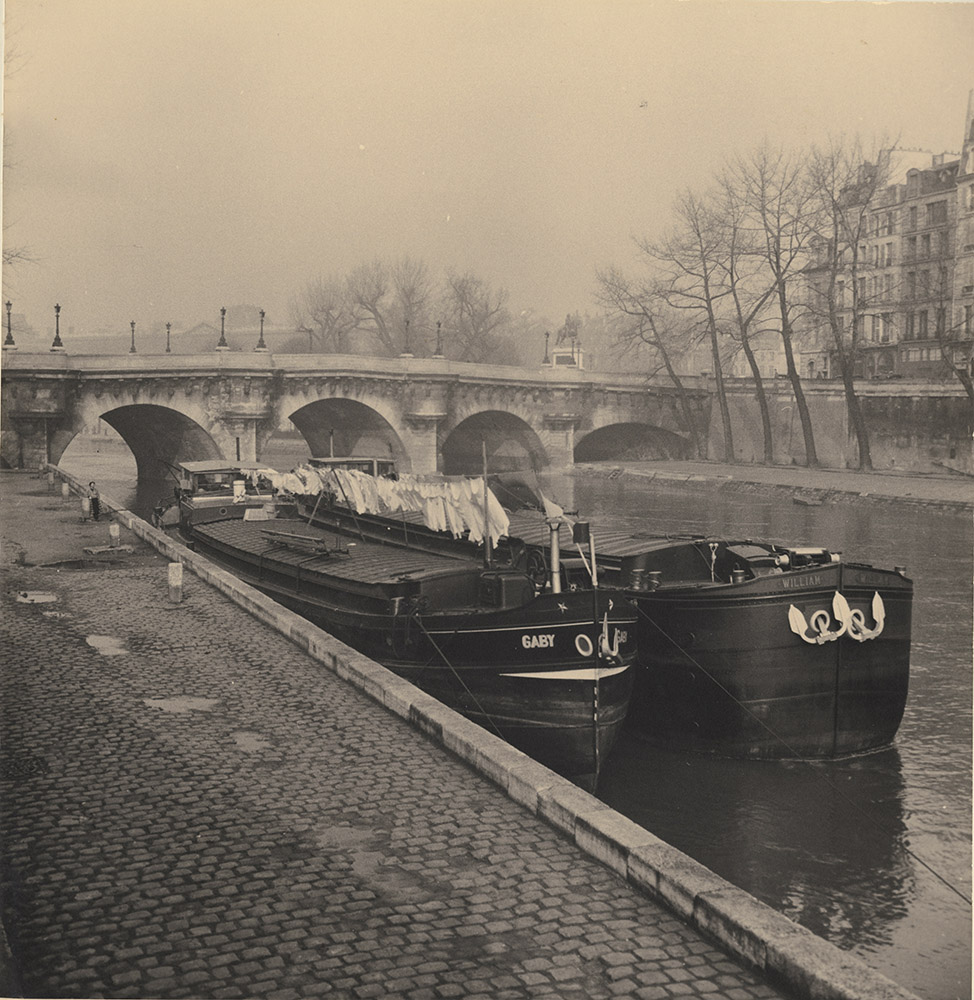 Photo Detail - Albert Monier - Barges with Laundry along the Seine with Pont Neuf in Background, Paris
