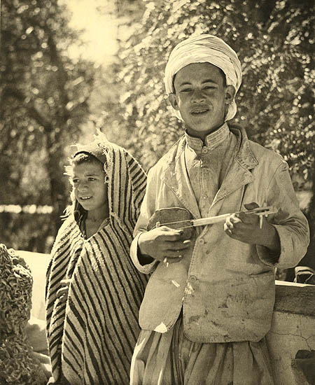 Photo Detail - Laure Albin-Guillot - Algerian Boy with String Instrument and Girl