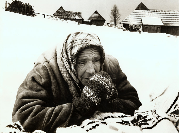 Photo Detail - Josef Cerhak - Old Woman Praying in a Snow-Covered Landscape