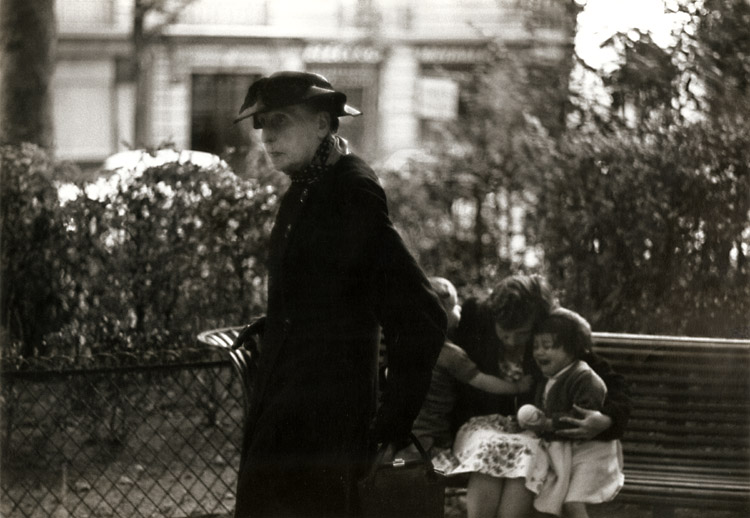 Photo Detail - Bruce Davidson - Widow of Montmartre, Mme. Fauché (with Children Comforted by Their Mother on Park Bench)