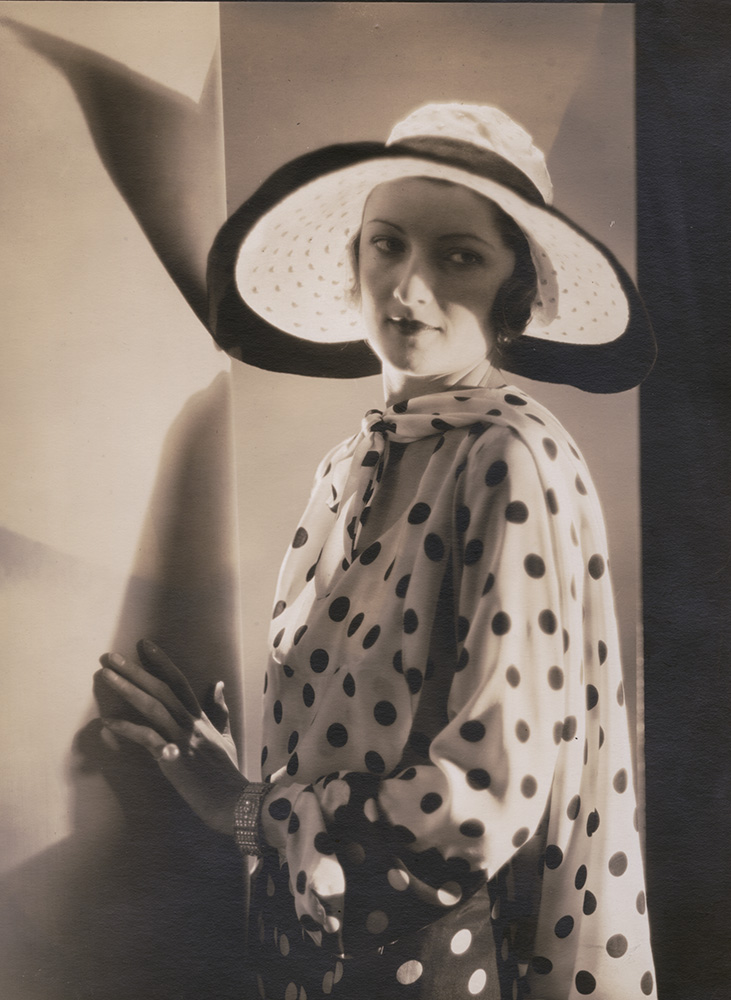 Vogue Magazine Photographer - Woman in Polka Dot Shirt and Hat