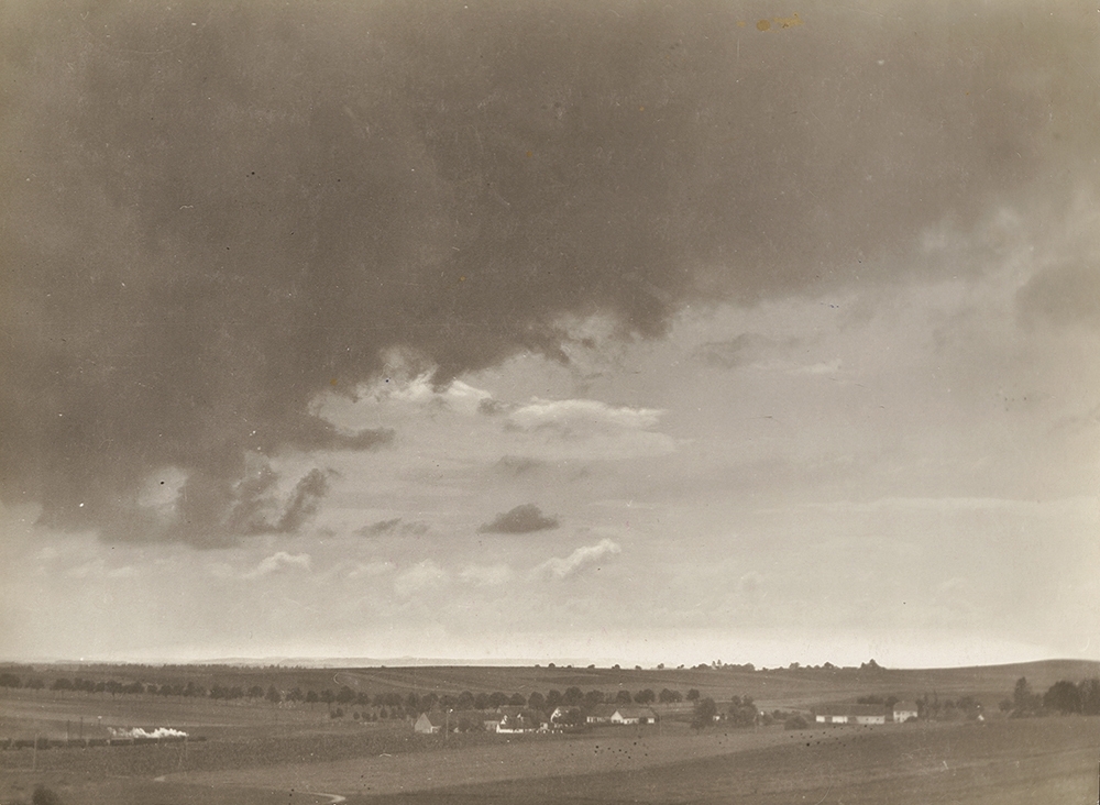 E. O. Hoppé - Base of Cumulus Cloud Over English Countryside with Train